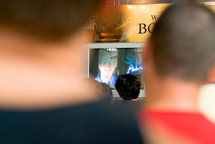 I can almost see him, through the haze of people's backsides I can almost see him, through the haze of people's backsides